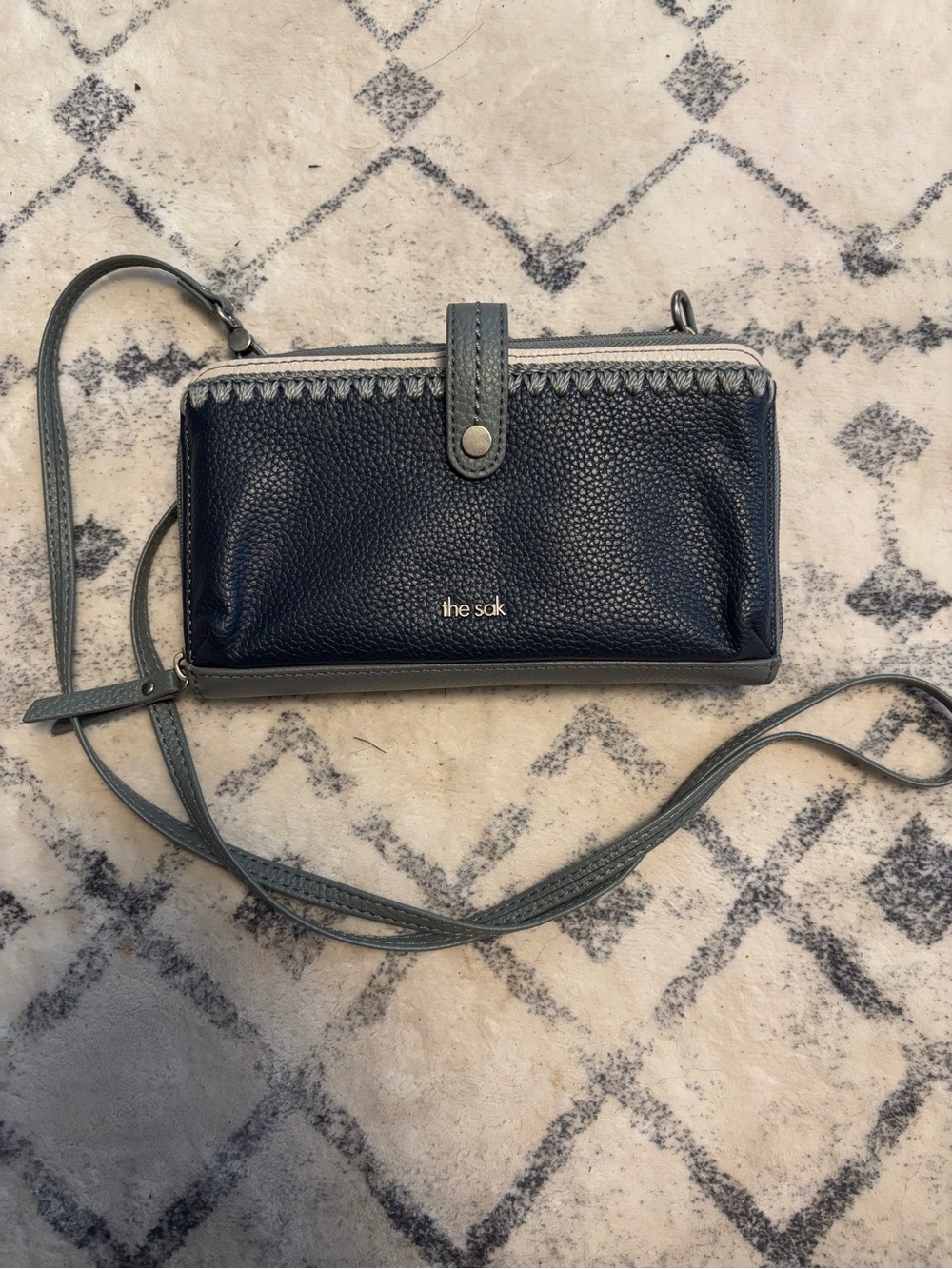 The Sak Navy Crossbody Wallet with Gray Trim and Strap